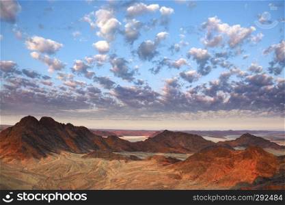 Aerial view of the early morning sunlight over the Namib Desert in Namibia.