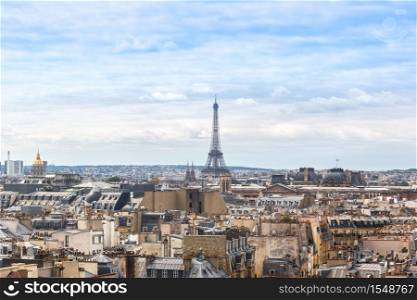 Aerial view of the Eiffel Tower in Paris, France in a beautiful summer day