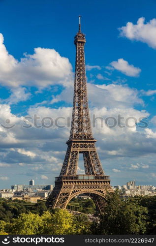 Aerial view of the Eiffel Tower in Paris, France in a beautiful summer day