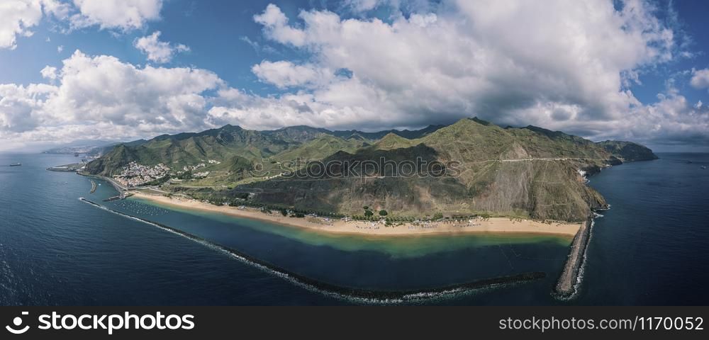 Aerial view of the famous white sand beach Playa de Las Teresitas with scenic San Andres village. Tenerife, Canary Islands, Spain