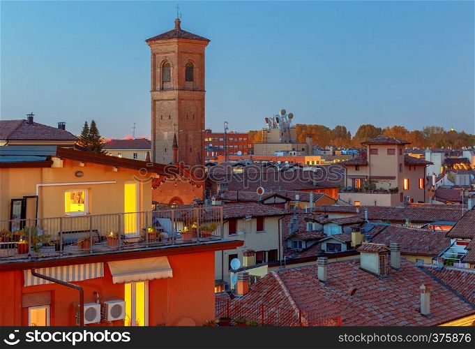 Aerial view of the historical part of the city and the tower on the Sunset. Bologna. Italy.. Bologna. Aerial view of the city.