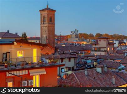 Aerial view of the historical part of the city and the tower on the Sunset. Bologna. Italy.. Bologna. Aerial view of the city.