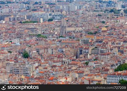 Aerial view of the historical part of the city on a sunny day. Marseilles. France.. Marseilles. Scenic aerial view of the city on a sunny day.