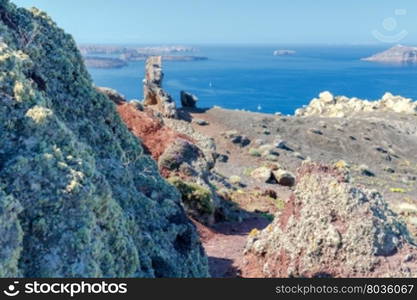 Aerial view of the island Santorini.. The picturesque aerial view from the mountains to the village Oia and the bay.