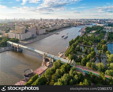 Aerial view of the main building of the Ministry of Defence of the Russian Federation, Pushkinsky (Andreevsky) over Moskva-river and Gorky park at summer, Moscow, Russia