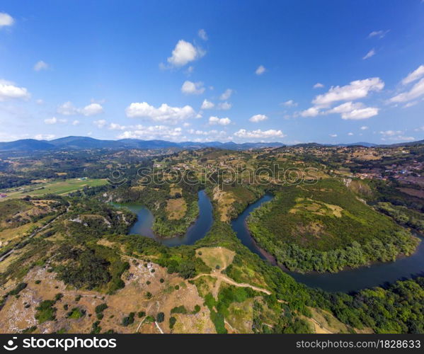 Aerial view of the meanders of the Nora river in Asturias, Spain.