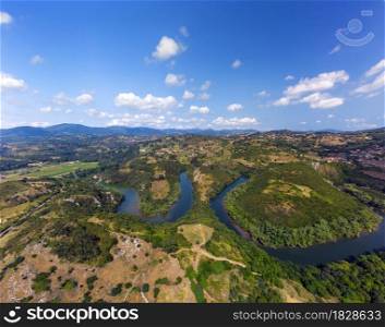 Aerial view of the meanders of the Nora river in Asturias, Spain.