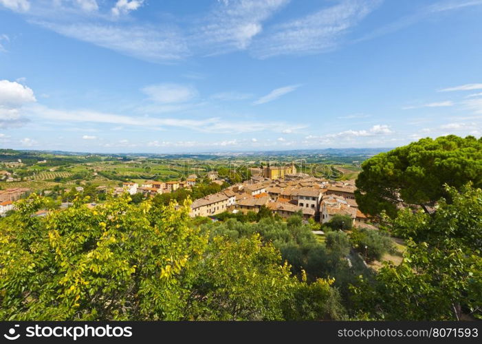 Aerial View of the Medieval City of Gimignano and Surrounding Tuscan Landscape in Italy