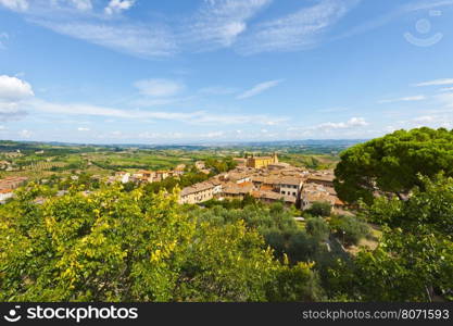 Aerial View of the Medieval City of Gimignano and Surrounding Tuscan Landscape in Italy
