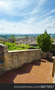 Aerial View of the Medieval City of Gimignano and Surrounding Tuscan Landscape in Italy