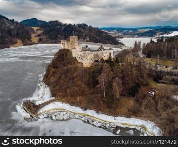 Aerial view of the Niedzica Castle (or Dunajec Castle) by the lake Czorsztyn, Poland, at early spring