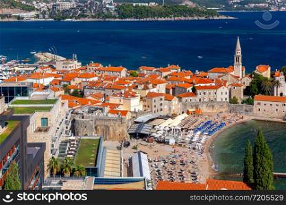 Aerial view of the old medieval historic city on a sunny day. Budva. Montenegro. Aerial view of Budva on a sunny day.