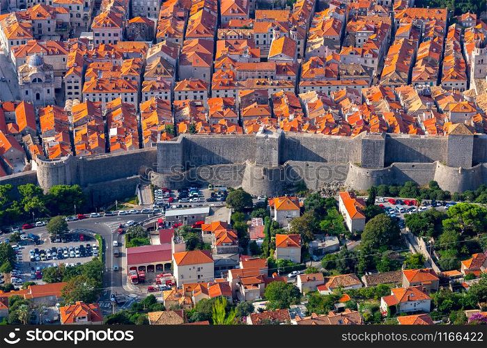 Aerial view of the old medieval historical part of the city on a sunny morning. Dubrovnik. Croatia.. Scenic aerial view of Dubrovnik city on a sunny morning.