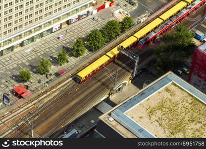 Aerial view of the S-Bahn tracks rapid train and tram train at the Alexanderplatz public square in Berlin.