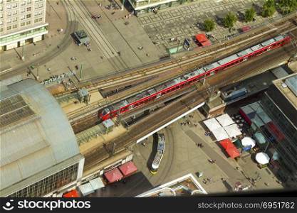Aerial view of the S-Bahn tracks rapid train and tram train at the Alexanderplatz public square in Berlin.