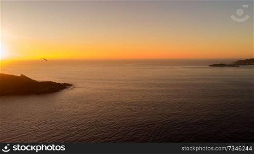 Aerial view of the sea at the sunset with beautiful colors