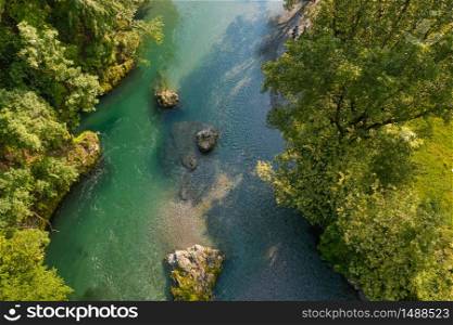 aerial view of the Serio river during the day, Val Seriana Bergamo.