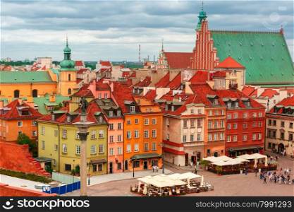Aerial view of the Sigismund Column and colorful houses at Castle Square in Warsaw Old town, Poland.