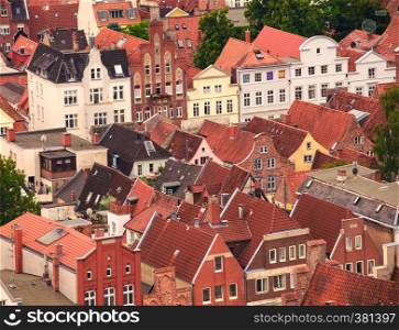 aerial view of tiled roofs of ancient town Lubeck, Germany