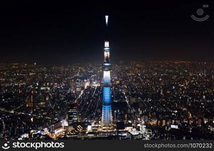 Aerial view of Tokyo Skytree and Japanese landscape in Tokyo city at night. Japan tourism, cityscape landmark, Asia travel destination, or modern building architecture concept