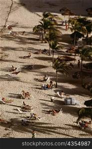 Aerial view of tourists relaxing on a beach, Nassau, Bahamas