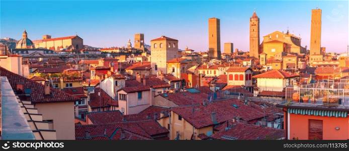 Aerial view of towers and roofs in Bologna, Italy. Aerial panoramic view of Bologna Cathedral and towers towering above of the roofs of Old Town in medieval city Bologna in the sunny day, Emilia-Romagna, Italy