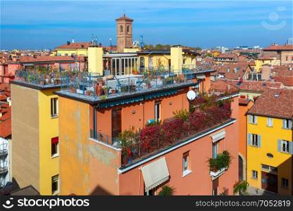 Aerial view of towers and roofs in Bologna, Italy. Aerial view of towers and roofs of Old Town in medieval city Bologna in the sunny day, Emilia-Romagna, Italy