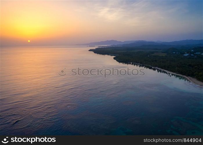 Aerial view of tropical beach at sunrise.Samana peninsula,Bahia Principe beach,Dominican Republic.