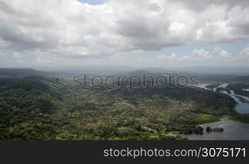Aerial view of tropical rainforest on the shore of Gatun Lake along the Panama Canal route.