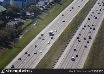 Aerial view of vehicles moving on a multiple lane highway, Interstate 4, Orlando, Florida, USA