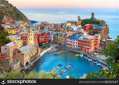 Aerial view of Vernazza fishing village at sunset, seascape in Five lands, Cinque Terre National Park, Liguria, Italy.