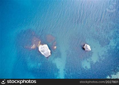 Aerial view of waves and sea rocks. Natural scene.
