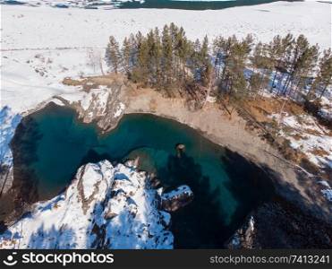 Aerial view of winter blue lakes in Altai mountains. Aerial view of winter blue lakes