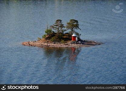 aerial view on scandinavian skerry coast with lighthouse