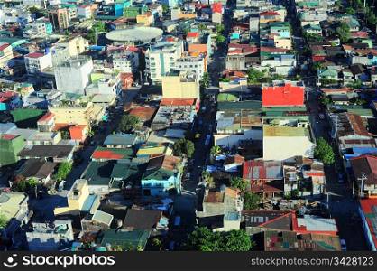 Aerial view on slum in Makati district - modern financial and business district of Metro Manila, Philippines