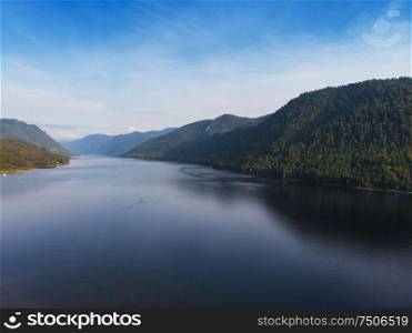 Aerial view on Teletskoye lake in Altai mountains, Siberia, Russia. Drone shot. Beauty summer day.. Aerial view on Teletskoye lake in Altai mountains