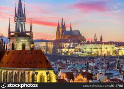 Aerial view over Church of Our Lady before Tyn, Old Town and Prague Castle at sunset in Prague, Czech Republic