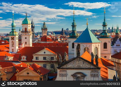 Aerial view over Old Town in Prague with domes of churches, Bell tower of the Old Town Hall, Powder Tower, Czech Republic