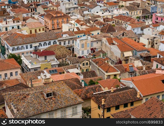 Aerial view over the old tiled roofs of the city of Nafplio in Greece. Tiled roofs of the old port town of Nafplio in Greece