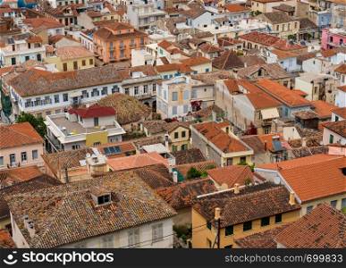 Aerial view over the old tiled roofs of the city of Nafplio in Greece. Tiled roofs of the old port town of Nafplio in Greece