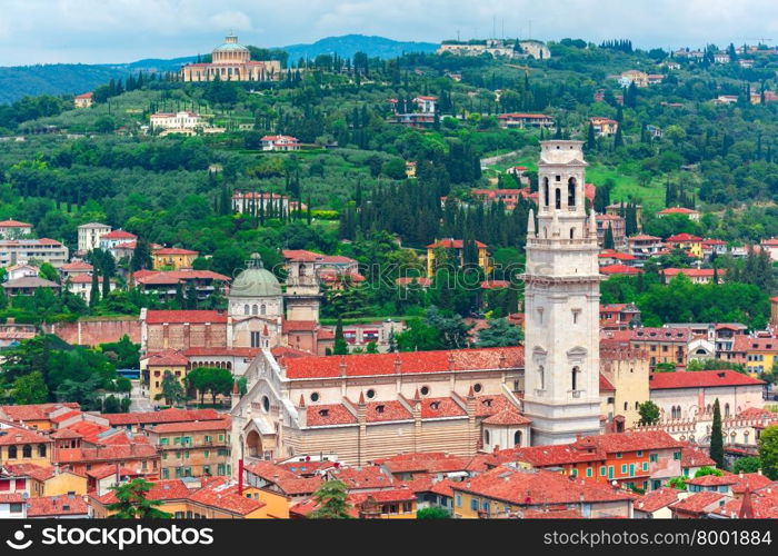Aerial view over Verona Cathedral Duomo, Sanctuary of Madonna of Lourdes and church San Giorgio in Braida in cloudy summer day, Verona, Italy
