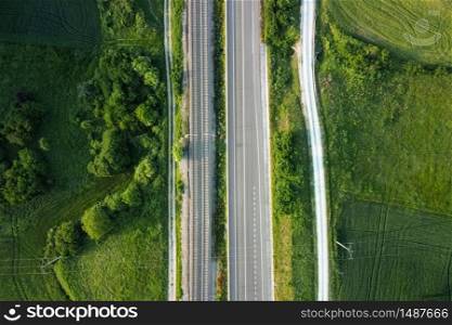 Aerial view, railway and road in rural landscape .. Aerial view, railway and road in rural landscape.