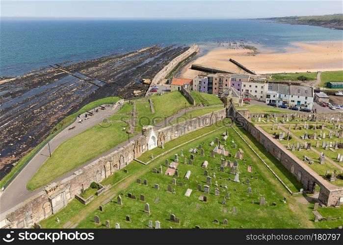 Aerial view Ruins and graveyard St Andrews cathedral near coast of North Sea, Scotland. Aerial view ruin cathedral near coast St Andrews, Scotland
