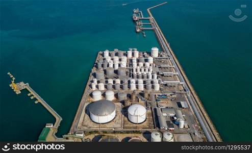 Aerial view tank farm terminal for bulk petroleum and gasoline storage, Crude oil storage fuel petrochemical terminal, Business global oversea commercial distribution petroleum product worldwide.