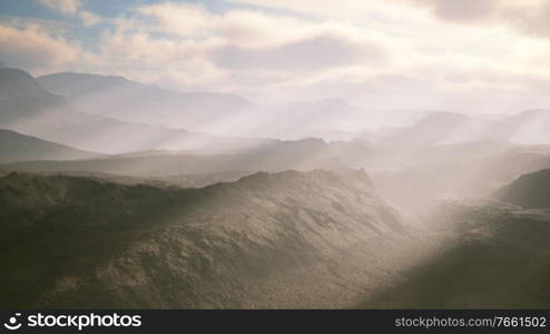 aerial vulcanic desert landscape with rays of light