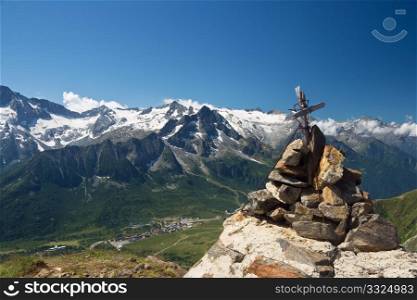 aeriel view of Tonale pass, Trentino, Italy, from the top of a mountain with cross