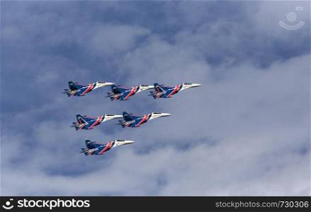 Aerobatic team performs flight at air show. Russia, Moscow Airshow in July 2017