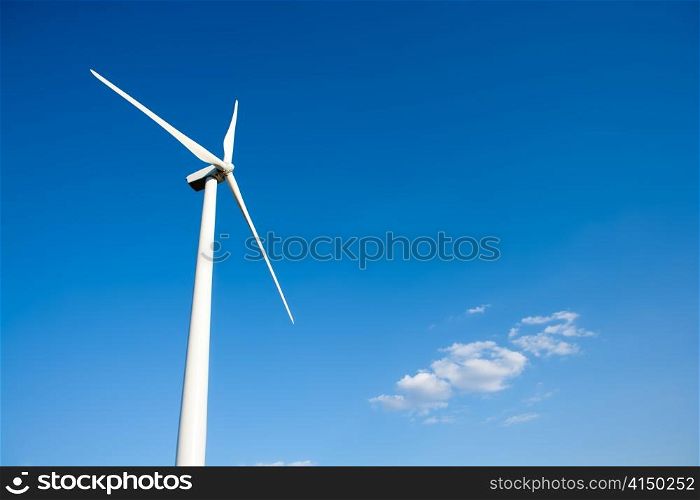 aerogenerator windmill in blue sky background
