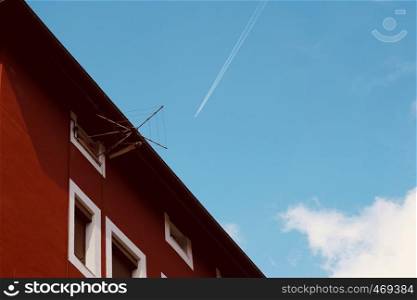 aeroplane flying in the blue sky in Bilbao city
