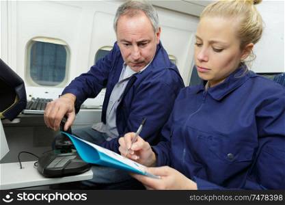 aerospace engineers in aircraft interior